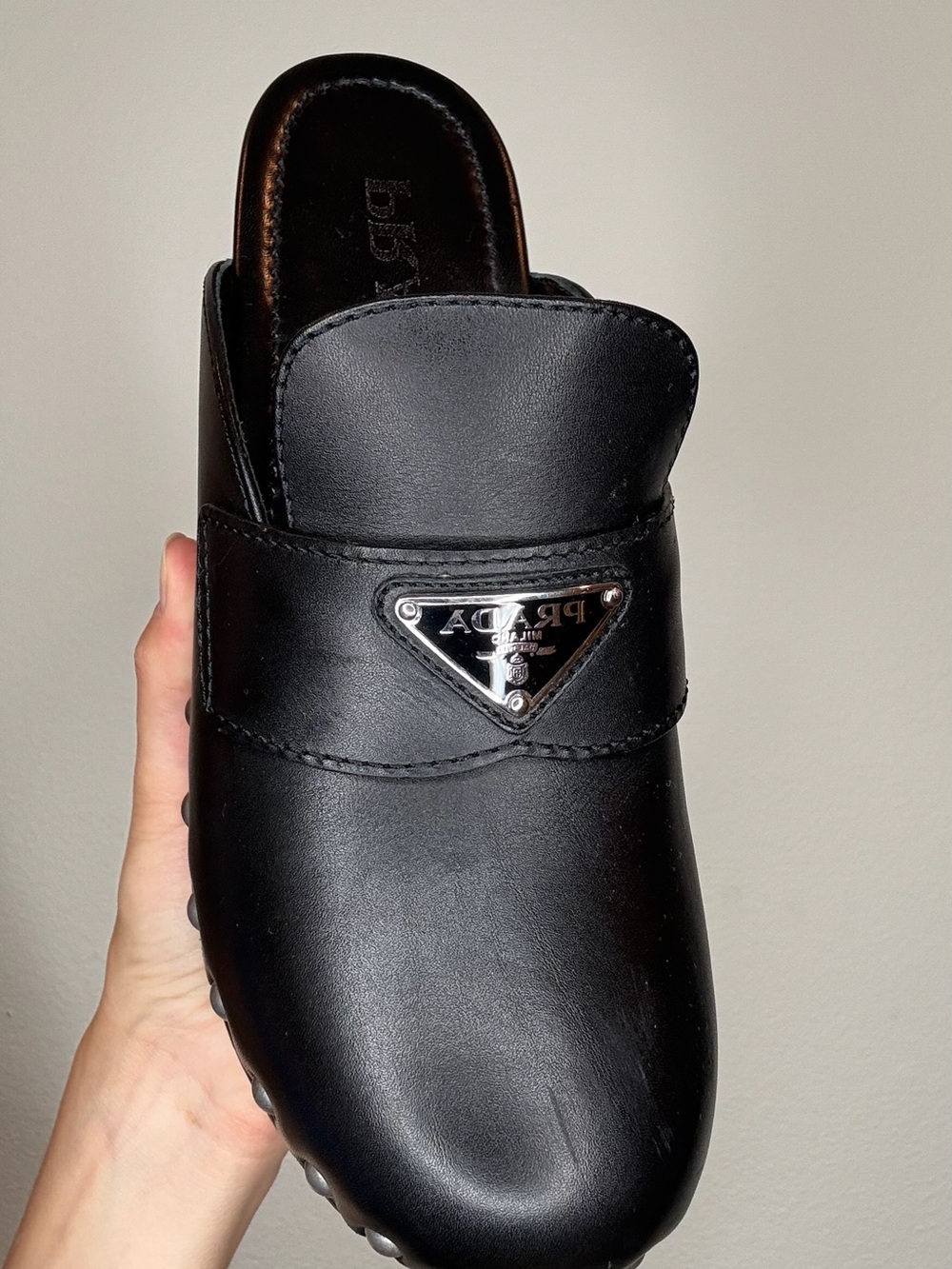 Prada black leather clogs